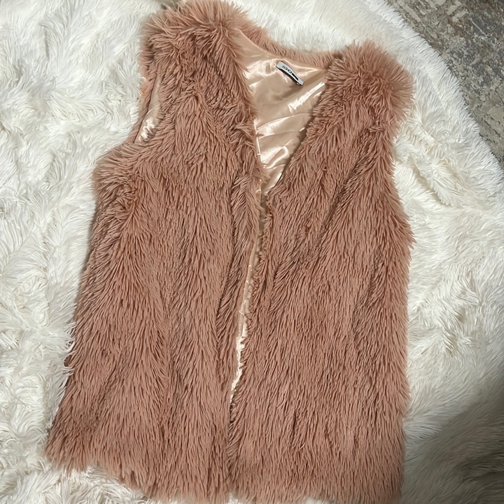 Nice rose pink vest great for fall fashion ideas